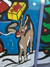 close up of rudolph artist rendering on windows