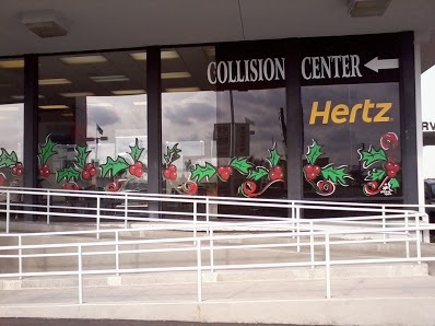 christmas holly painted on dealership