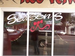 seasons greeting and reef pic of window painting in san diego